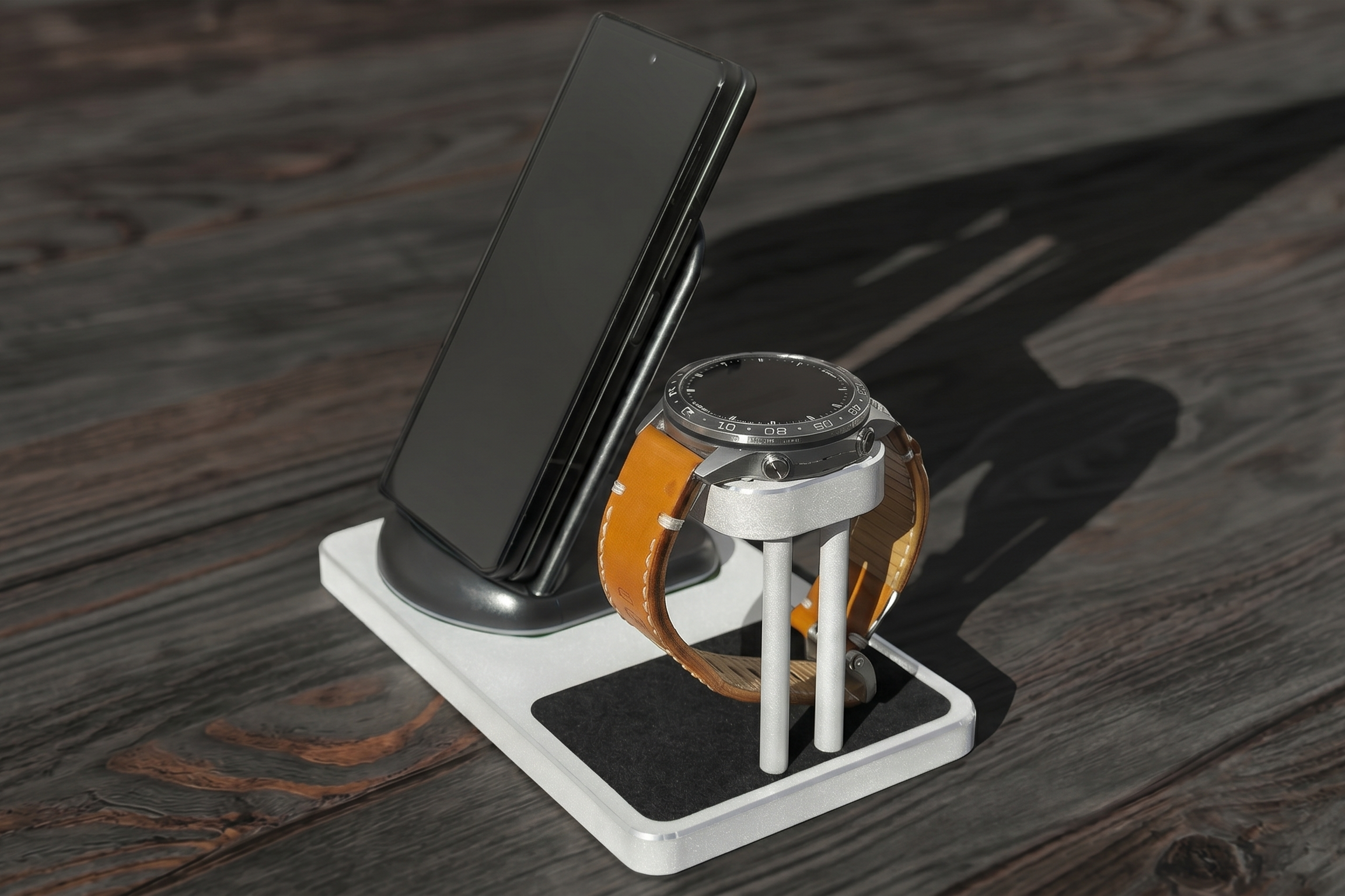 Phone and watch on a white stand on a wooden surface
