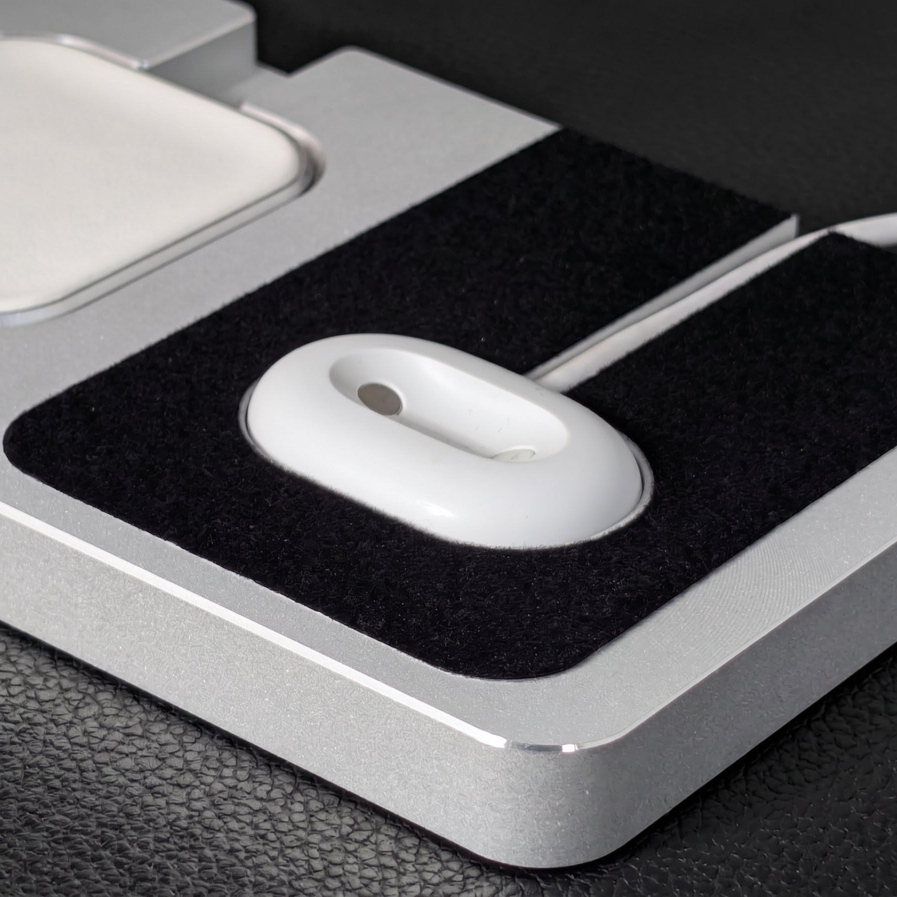 Pixel watch 4 charger in a stand