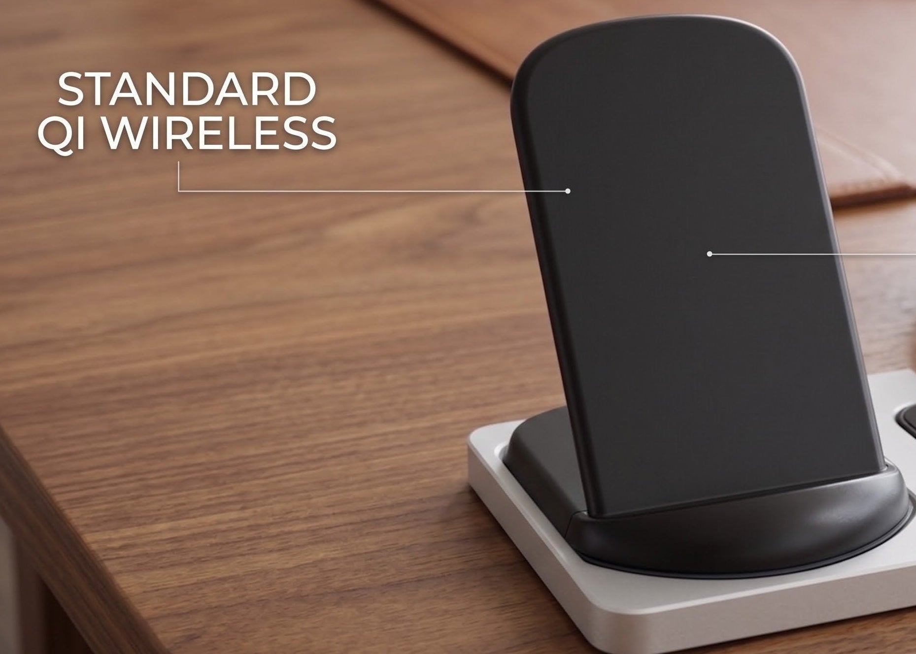 Wireless charging station on a desk with a smartphone on top